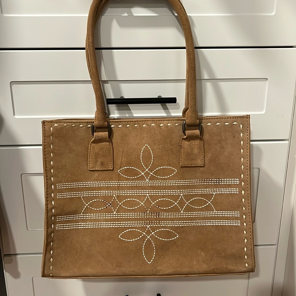 Boot stitch suede bag